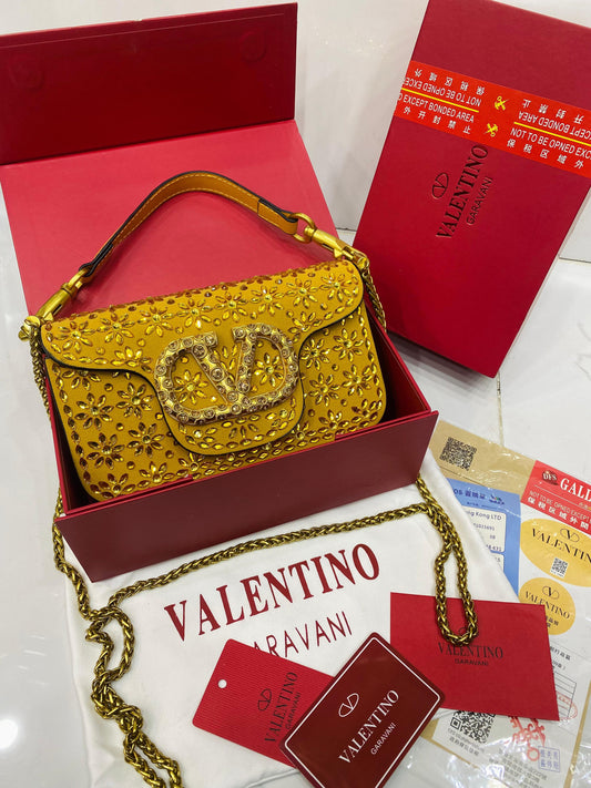Valentino Garavani Locò velvet clutch with jewel logo