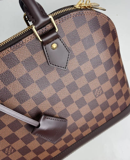 Louis Vuitton Alma PM Handbag